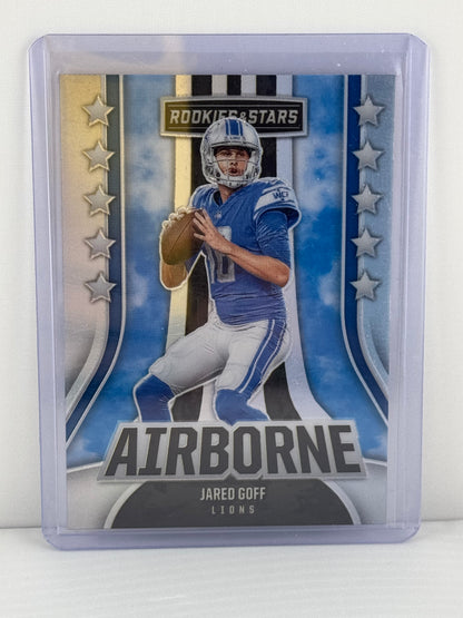 2023 Rookies & Stars #AI-11 Jared Goff Airborne Silver Prizm Detroit Lions