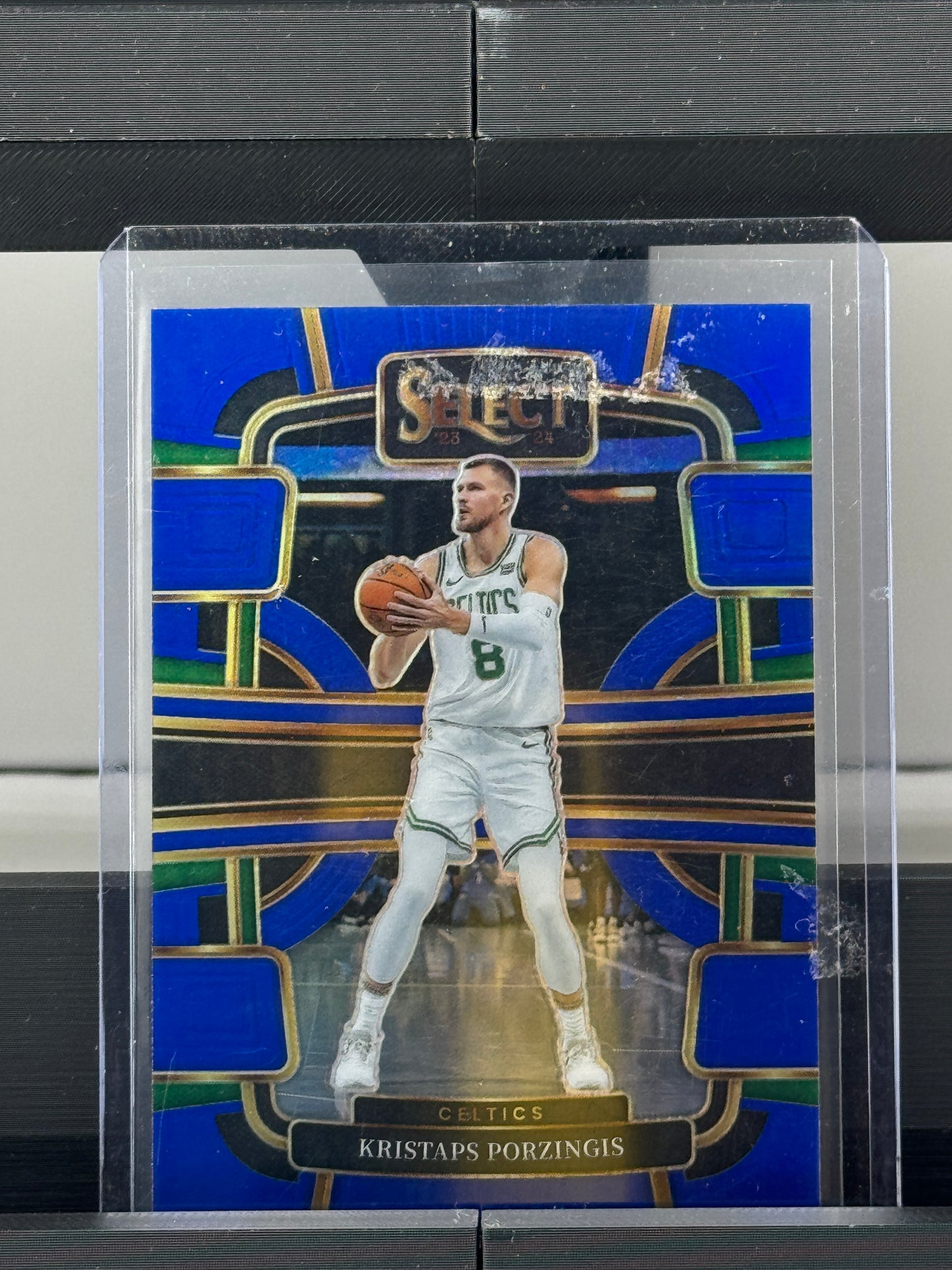 2023-24 Select #62 Kristaps Porzingis Concourse Blue Prizm SP Boston Celtics